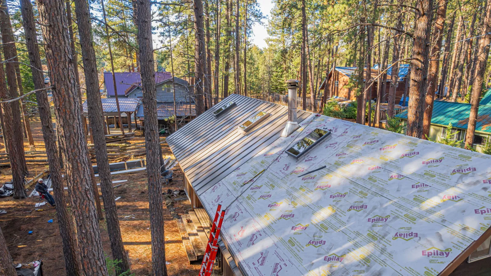 New underlayment installed across the prepared roof deck