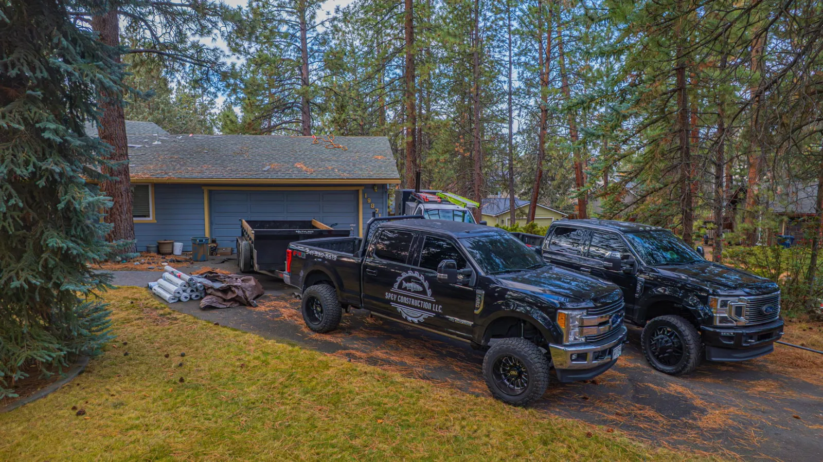 Spey Roofing truck parked at a Bend, Oregon home during a roof replacement