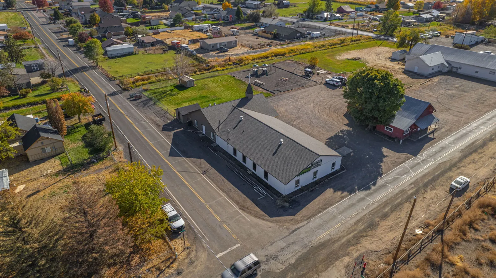 Street-side aerial of the church with its completed roof