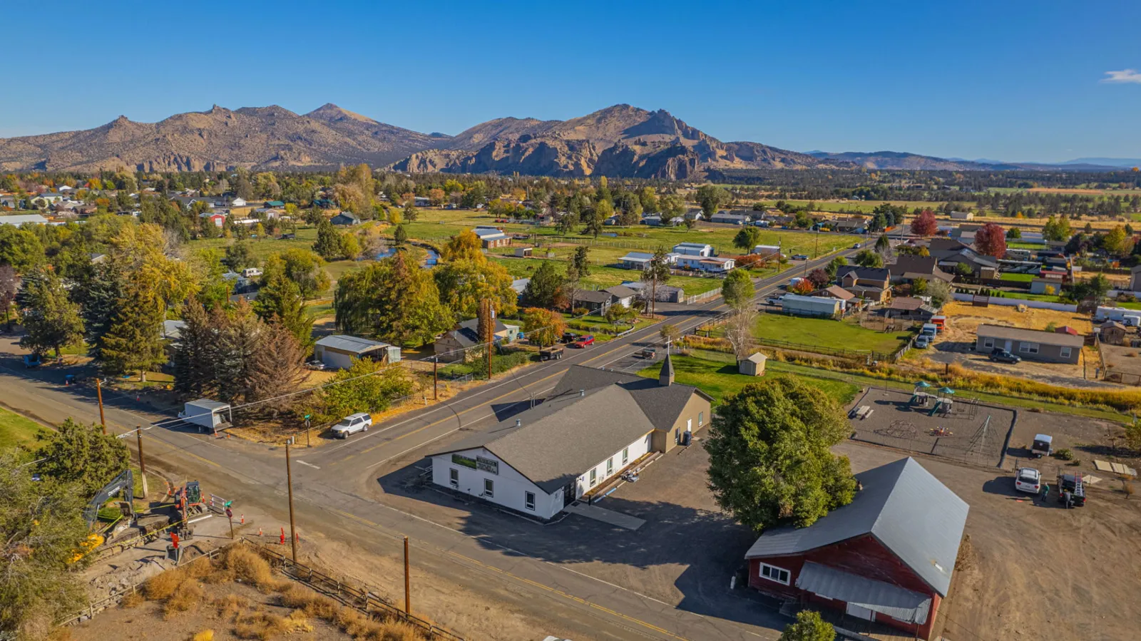 Aerial view of the church neighborhood with Smith Rock in the background